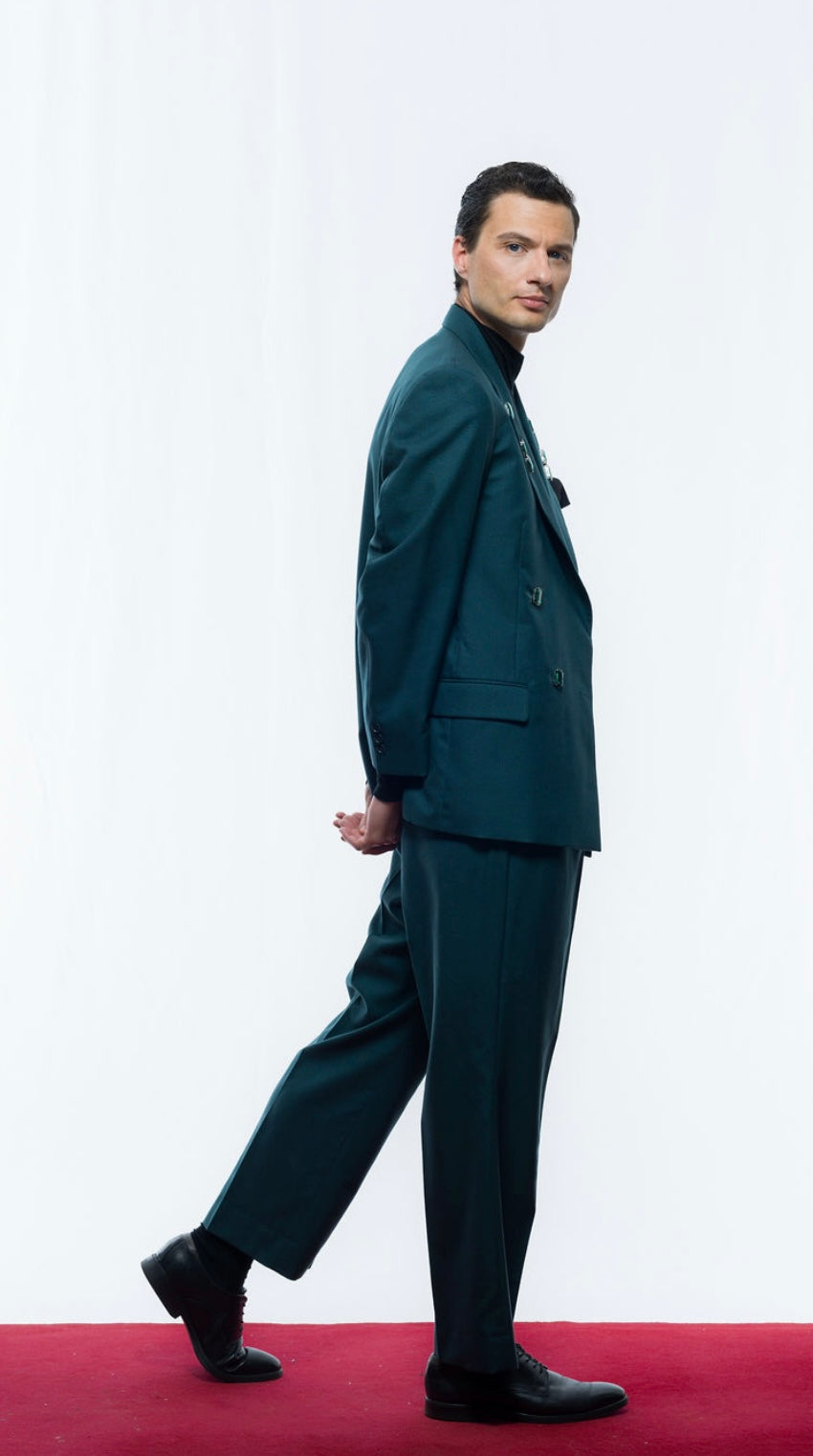 Coloured suit with green gems